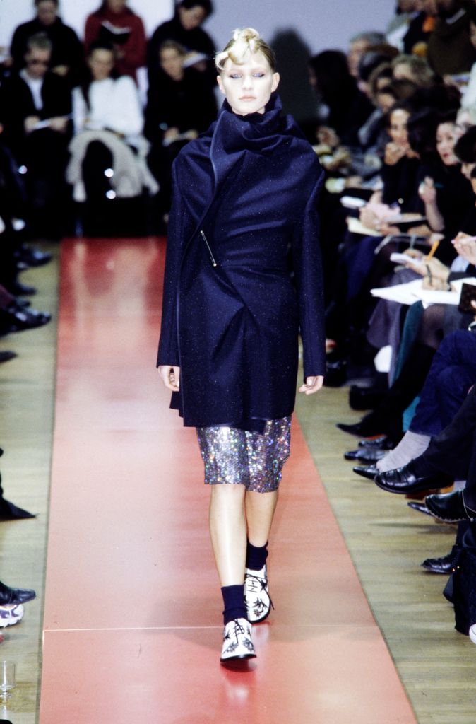 A model walks in the Comme Des Garcons Fall 1999 Ready to Wear Runway Show on March 9, 1999, i