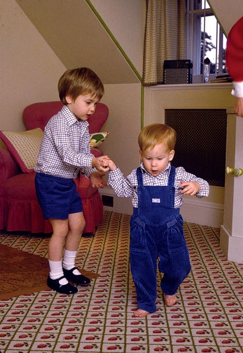 Prince William helps Harry learn to walk