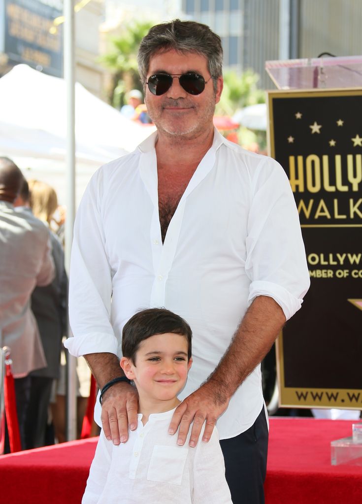 Simon Cowell and Eric Cowell attend the ceremony honoring Simon Cowell with a Star on The Hollywood Walk of Fame held on August 22, 2018 in Hollywood, California.