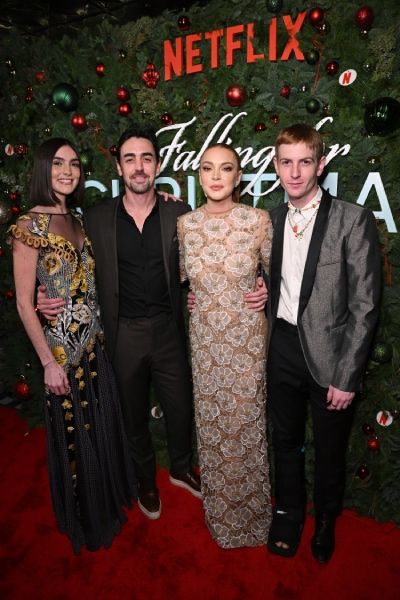 lindsay lohan and her siblings at the falling for christmas premiere