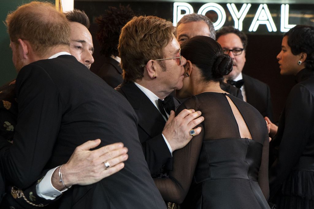 Harry and Meghan with Sir Elton John and David Furnish