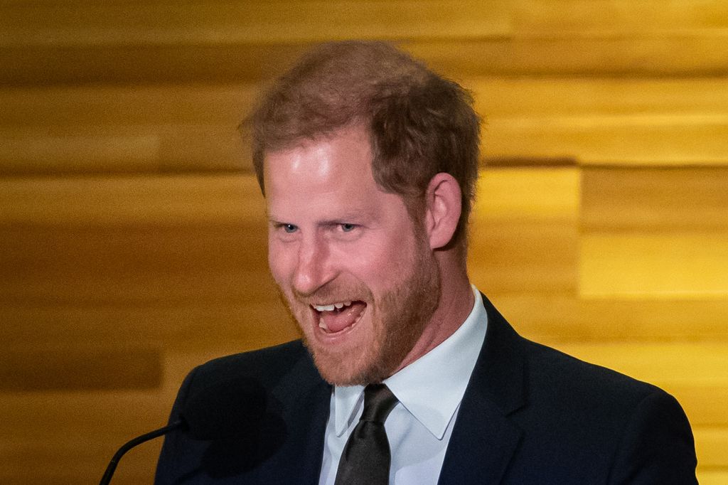 Prince Harry, the Duke of Sussex smiles after making a joke during the "One Year to Go" Invictus Games dinner