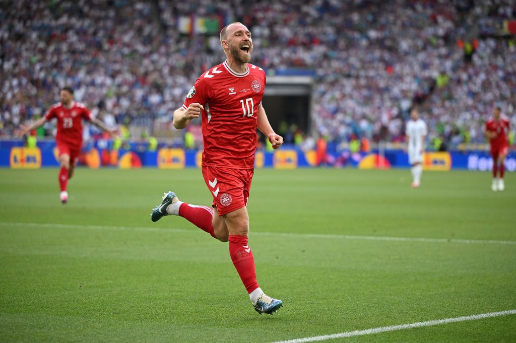  Christian Eriksen of Denmark celebrates scoring his team's first goal during the UEFA EURO 2024 group stage match between Slovenia and Denmark