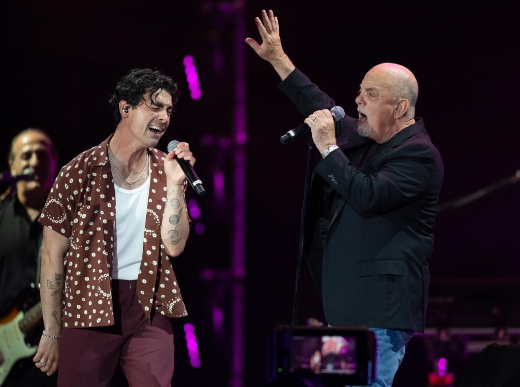 Billy Joel and Joe Jonas perform on the Oak Stage at the American Express Presents BST Hyde Park