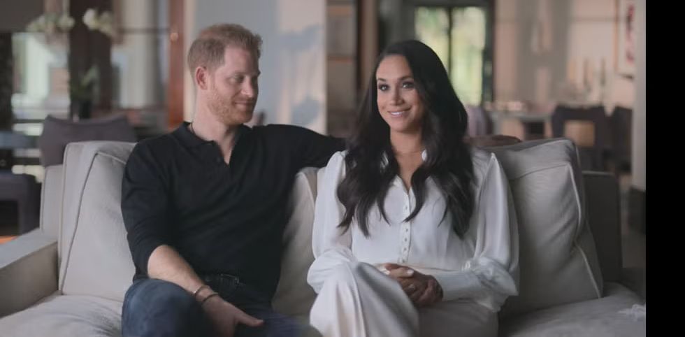  Harry & Meghan sitting on sofa being interviewed