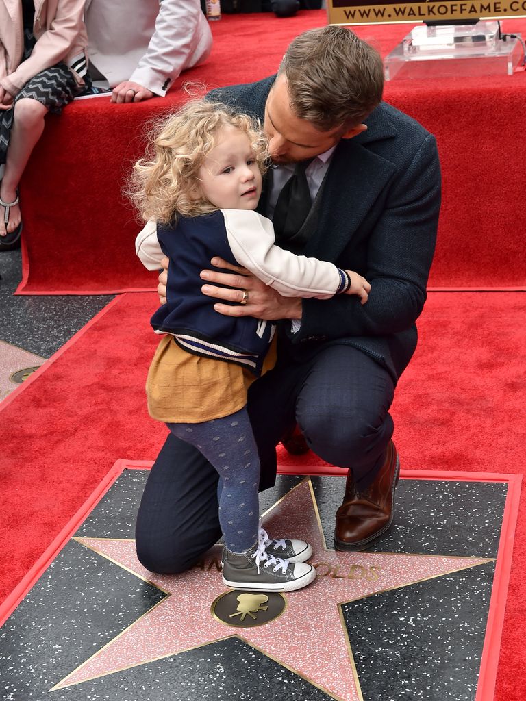 Actor Ryan Reynolds and daughter James Reynolds attend the ceremony honoring Ryan Reynolds with a Star on the Hollywood Walk of Fame on December 15, 2016 in Hollywood, California.