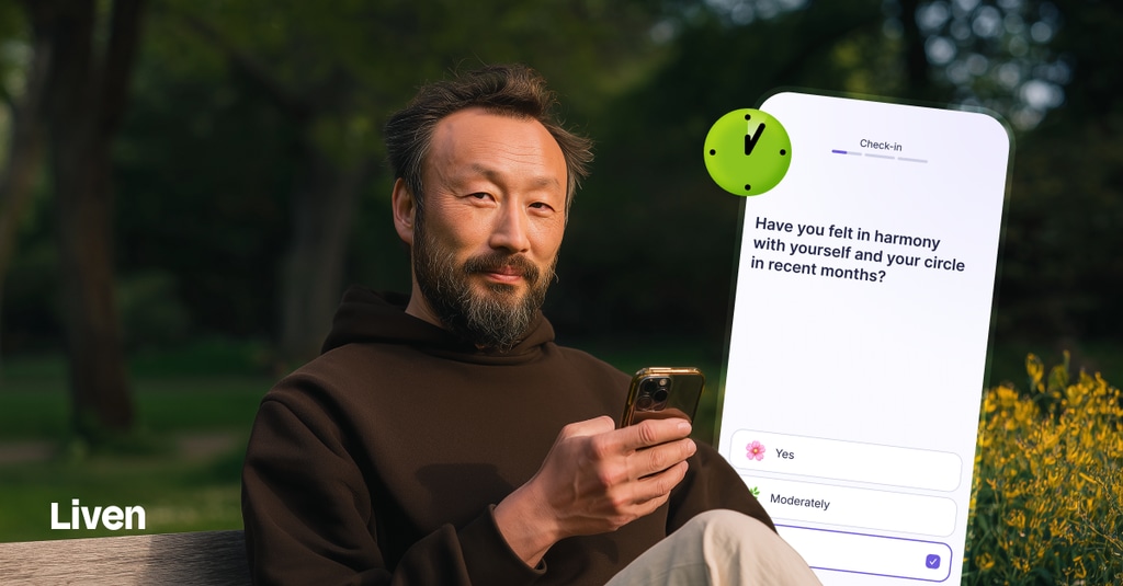 Homme utilisant l'application Liven au téléphone au parc