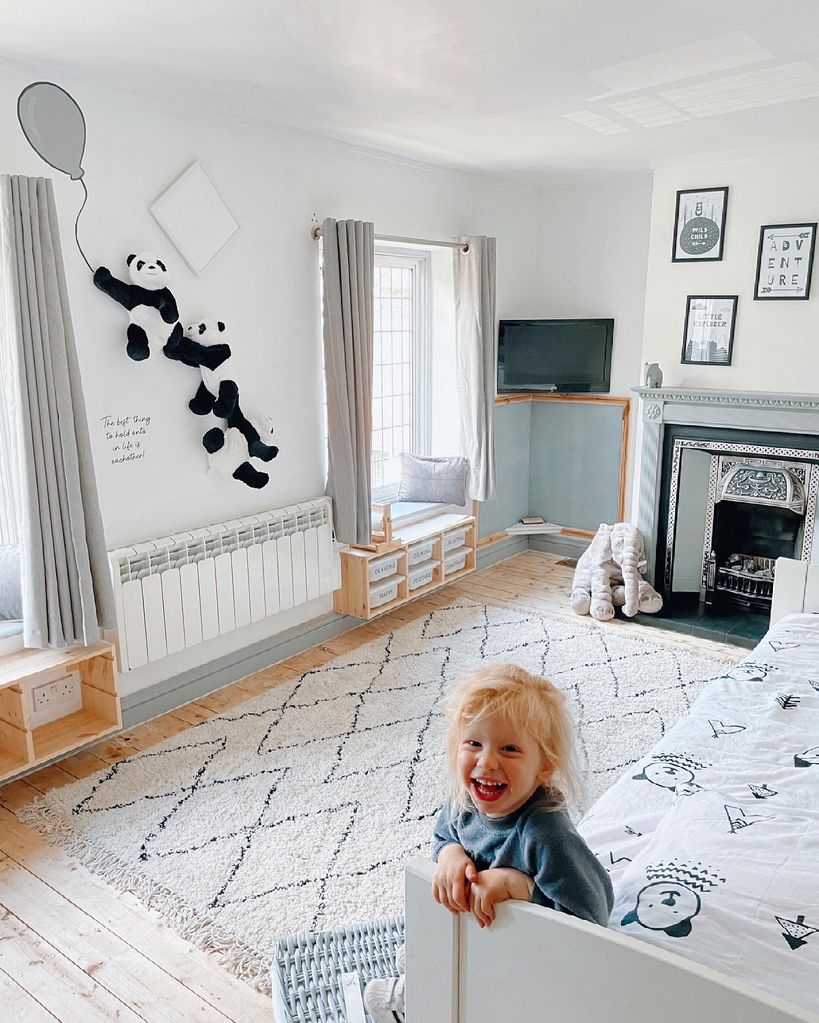 Rex in his bedroom with a panda theme 