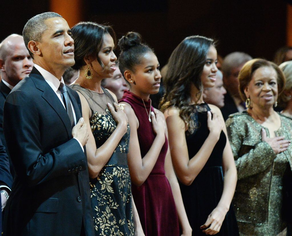 U.S. President Barack Obama, First Lady Michelle Obama, Sasha Obama, Malia Obama, and Marian Shields Robinson attend TNT Christmas in Washington 2014 at the National Building Museum on December 14, 2014 in Washington, DC.