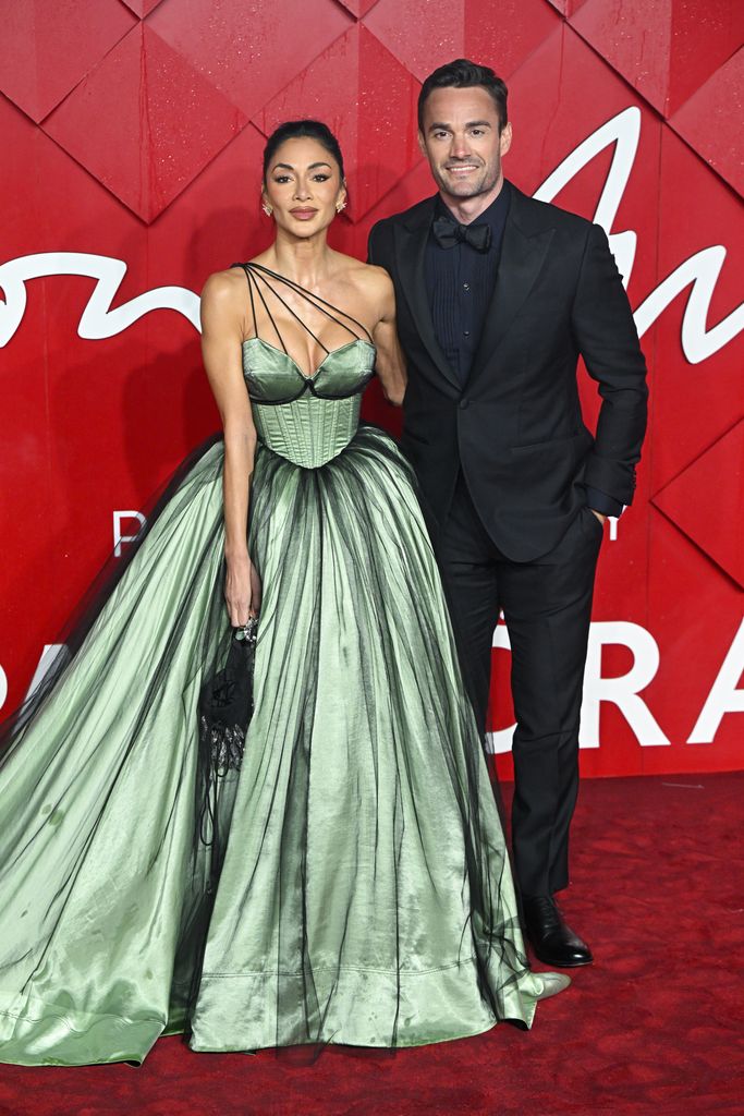 nicole on red carpet with thom