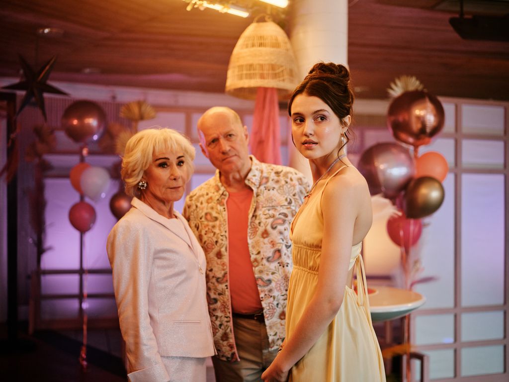 three people at party