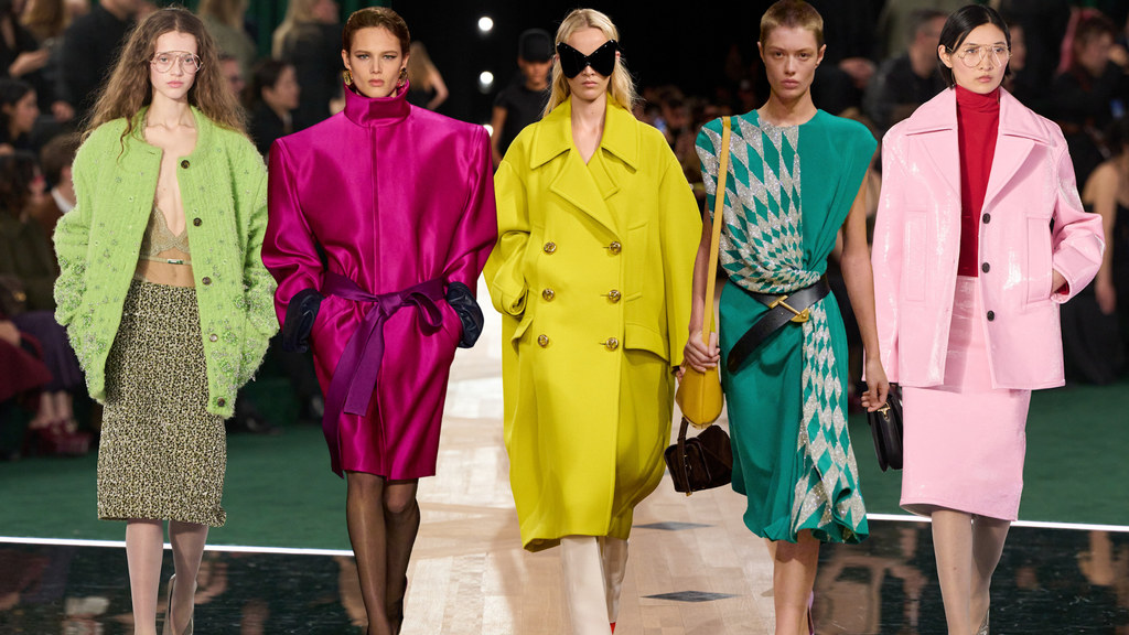 models on runway in colourful outfits