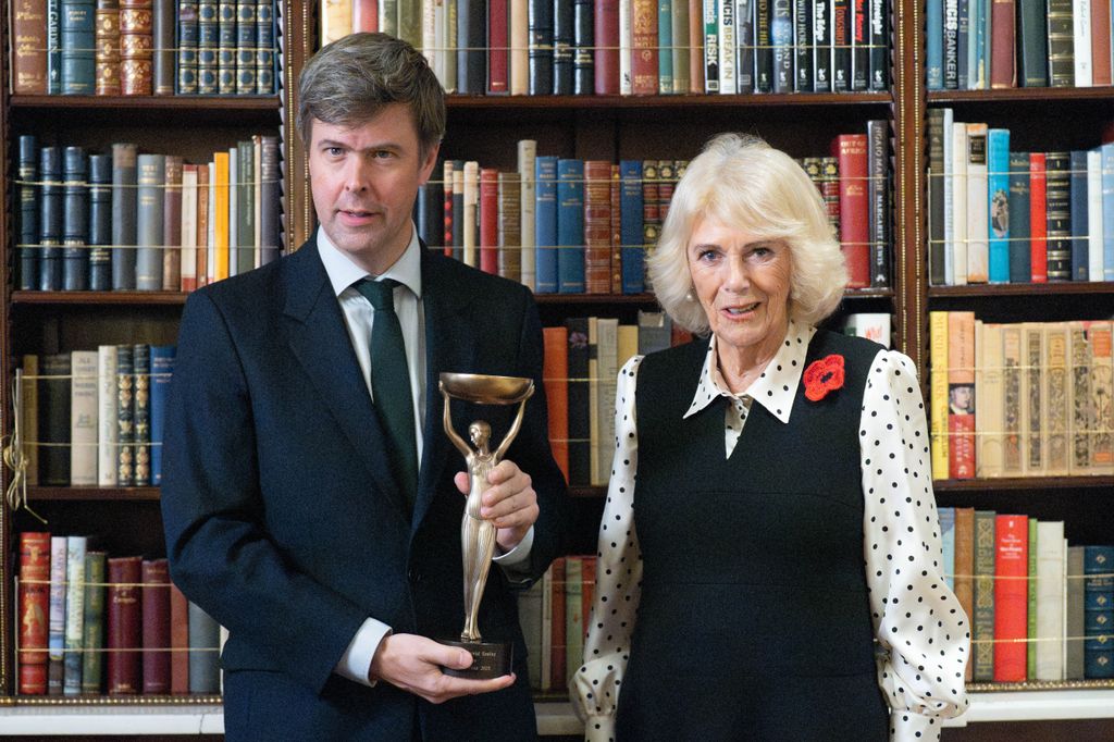 Queen Camilla with 2025 Booker prize winner David Szalay during a reception for shortlisted authors, judges and supporters