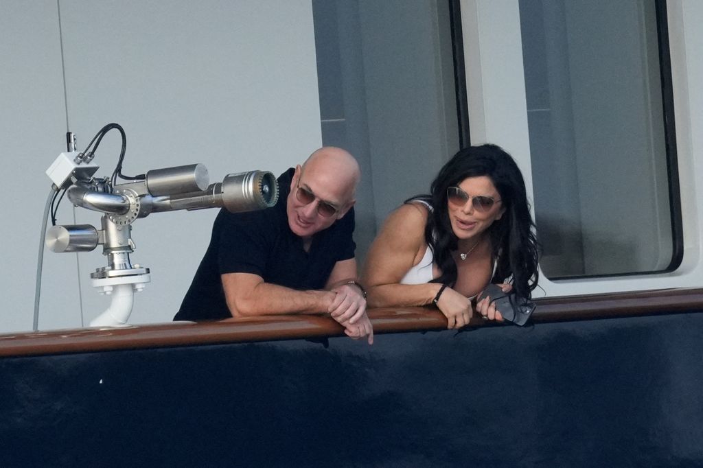 Jeff Bezos and Lauren Sanchez admire the view from the yacht
