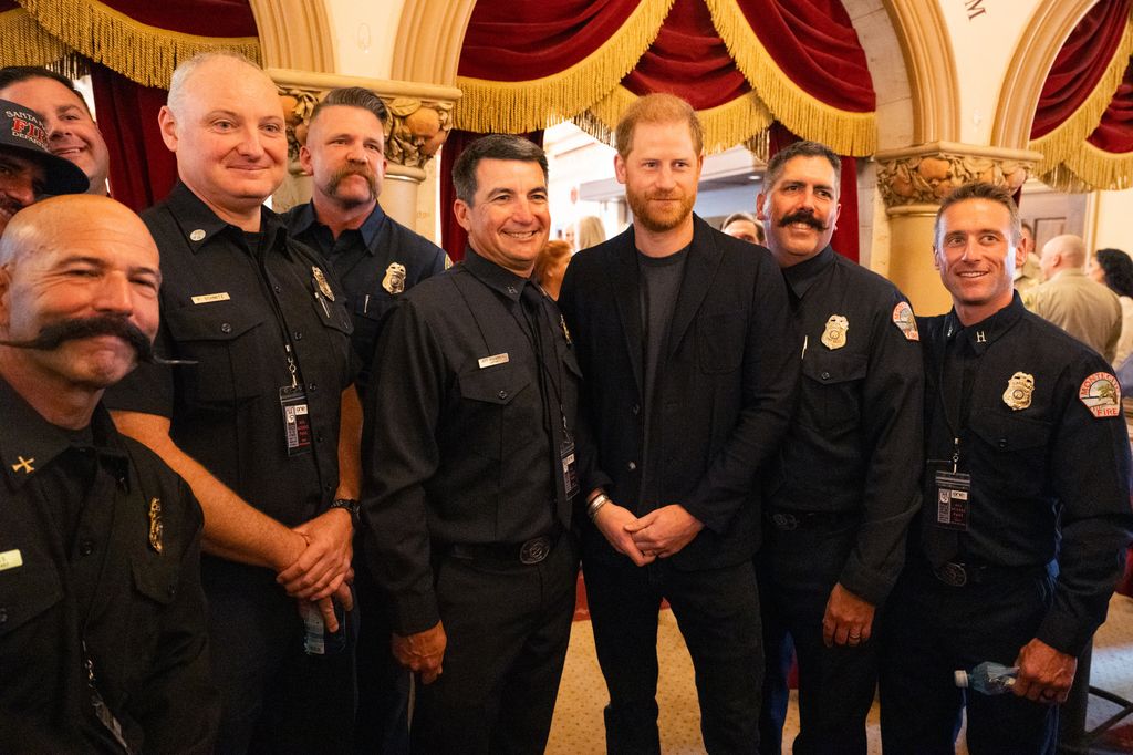 prince harry posing for group photo