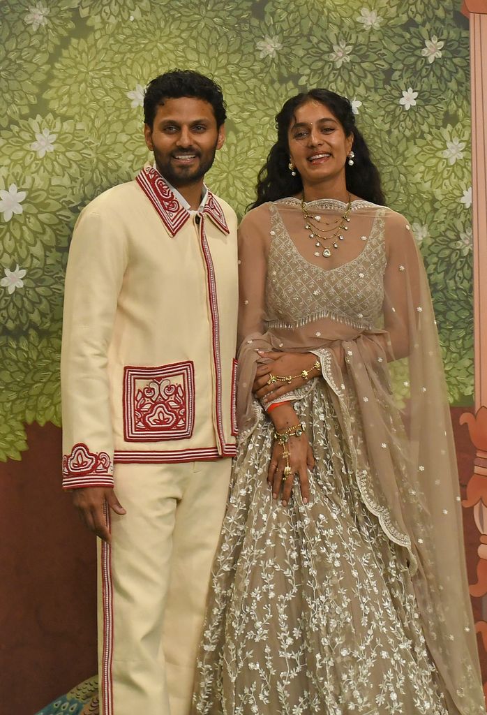 Jay Shetty poses for a photo with his wife Radhi Devlukia Shetty on the red carpet during the blessings ceremony of the newly married couple Anant Ambani and Radhika Merchant in Mumbai, 2024/07/13