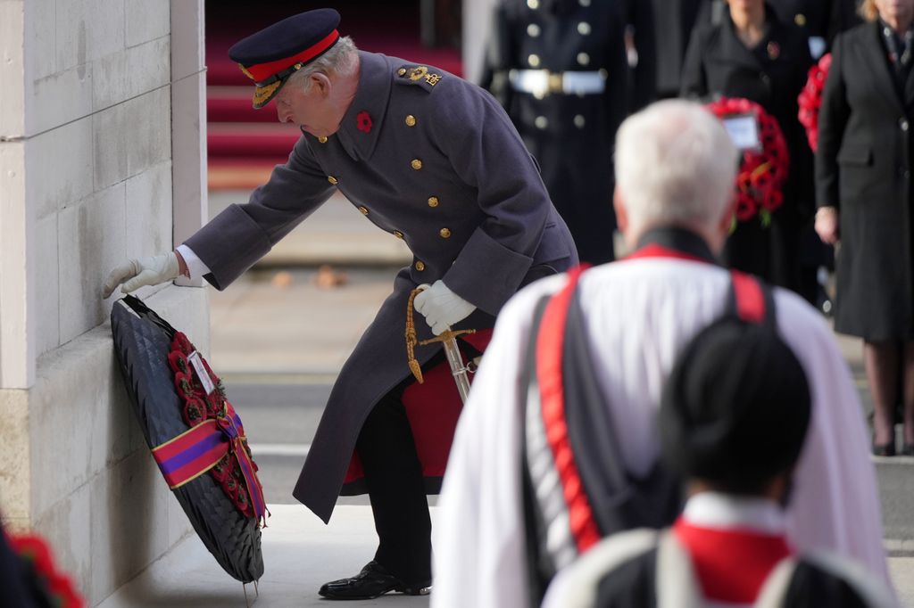 King Charles III lays down a wreath as he attends the Remembrance Sunday ceremony at the Cenotaph 