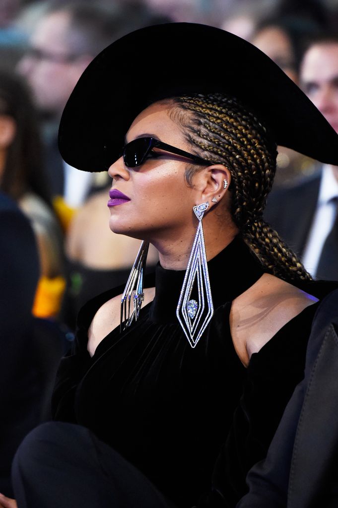 Beyonce side ways with statement earrings