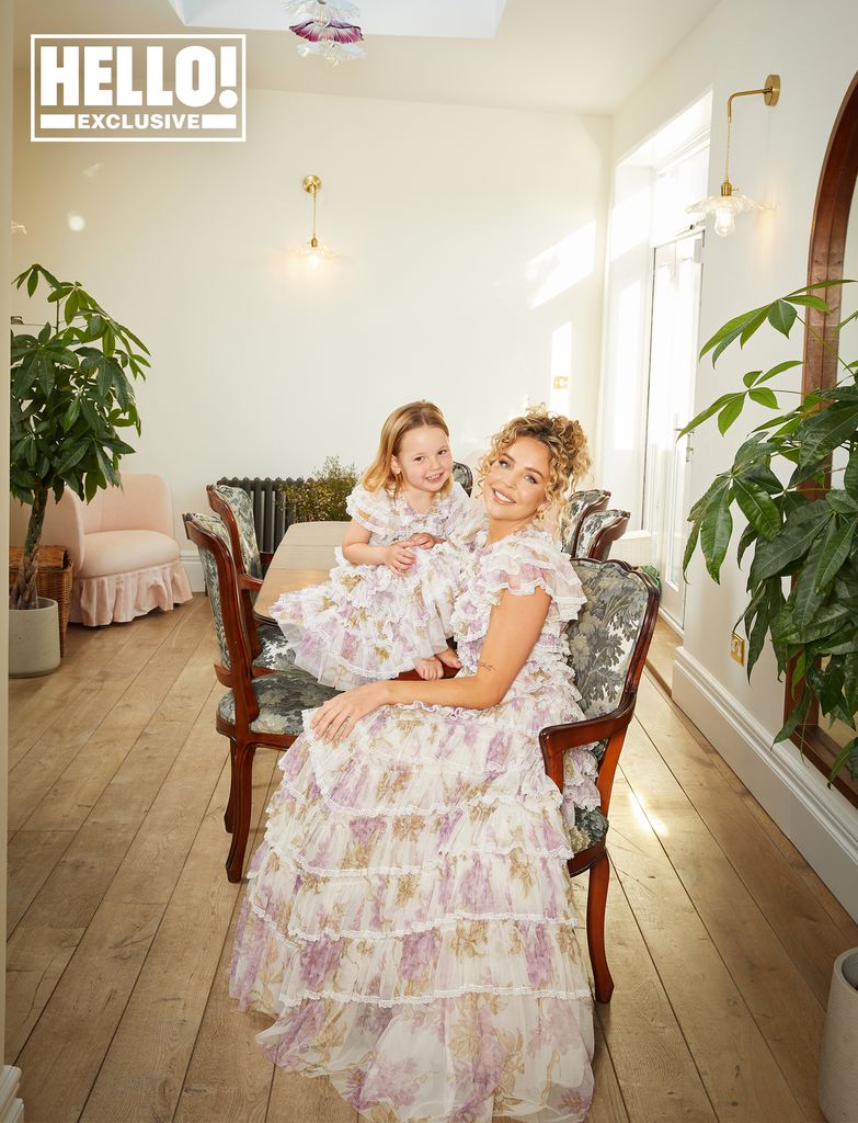 Lydia Bright posing at home with daughter Loretta
