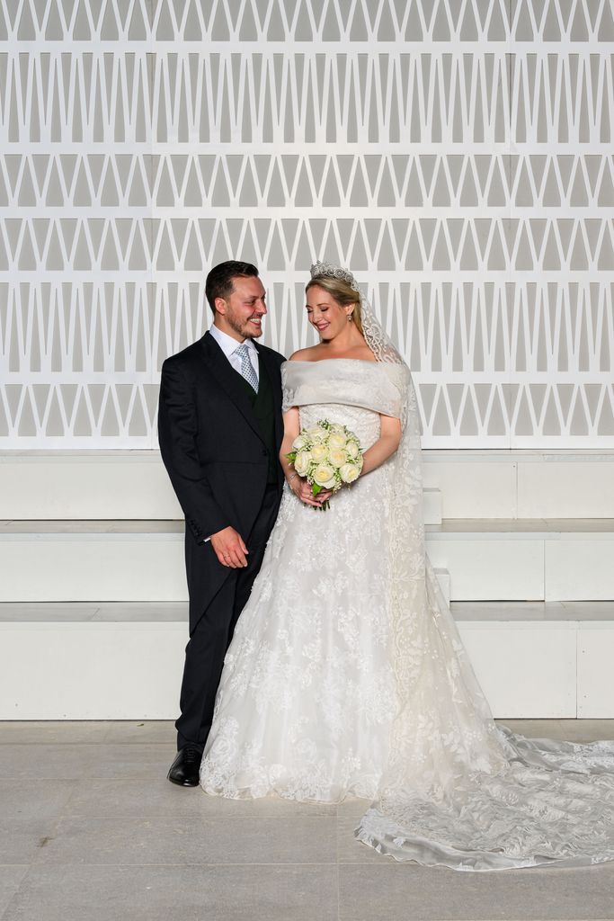 couple posing on wedding day