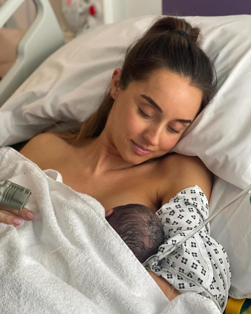 Emily Andre looking at baby daughter