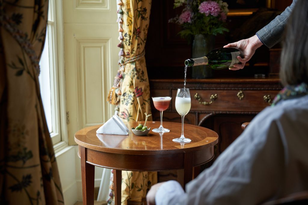 Wine being poured into a glass