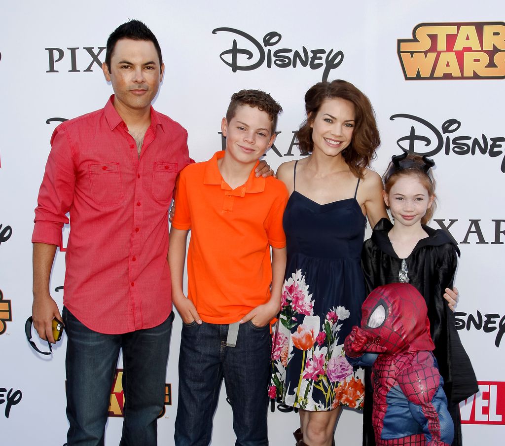 Michael Saucedo, Rebecca Herbst and family attend the Disney's VIP Halloween event at Disney Consumer Products Campus on October 1, 2014 in Glendale, California