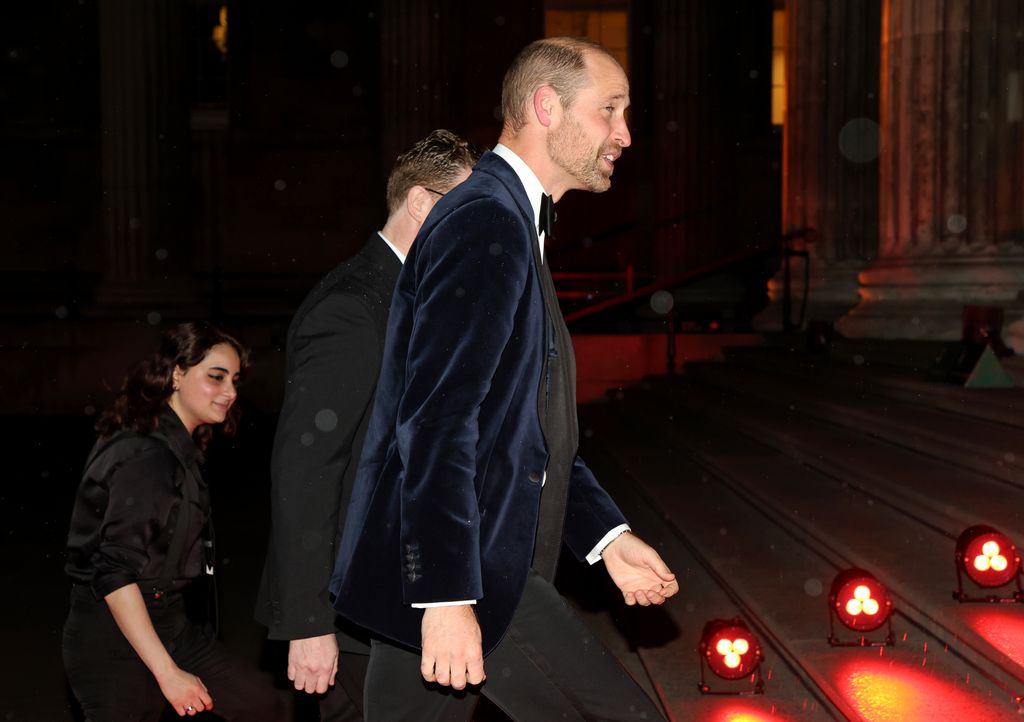 Prince William walking up the stairs at the British Museum