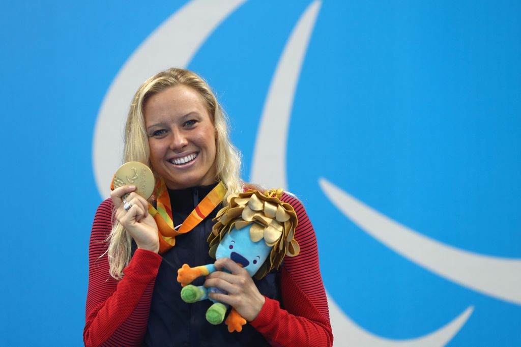 Gold medalist Jessica Long of the United States celebrates on the podium at the medal ceremony for Women's 200m Individual Medley - SM8 on day 10 of the Rio 2016 Paralympic Games at the Olympic Aquatics Stadium on September 17, 2016 in Rio de Janeiro, Brazil.  