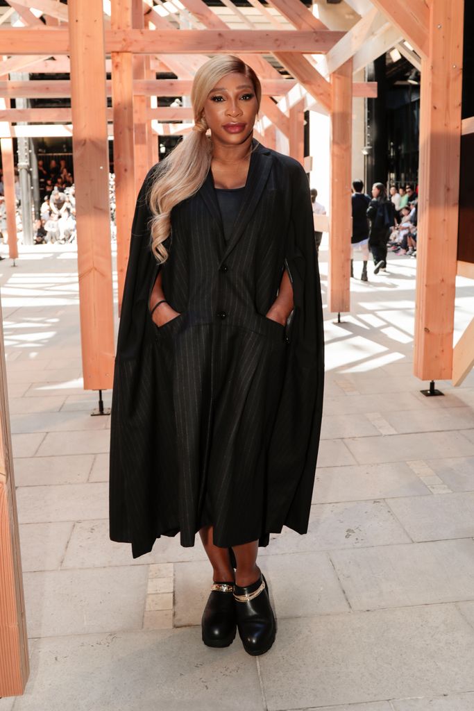 Serena Williams in black caped coat