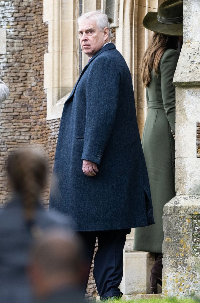 Prince Andrew standing outside of a church