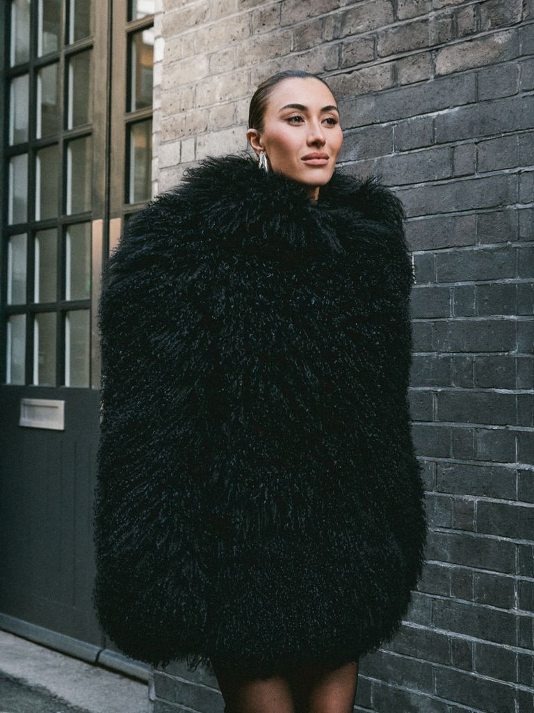 Coat: Josephine Jones, £2100.
Tights: Falke, £27.
Earrings: Alexis Bittar, $245