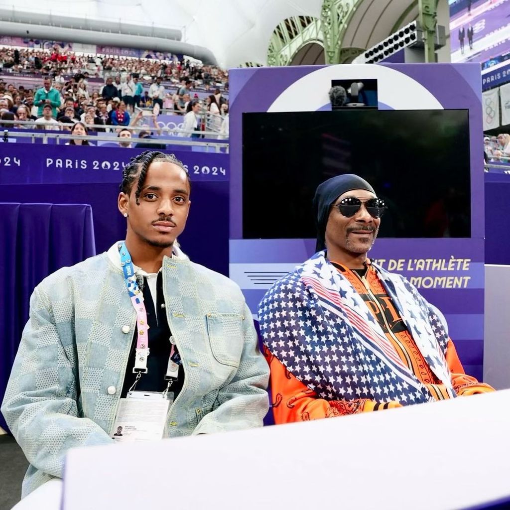 Cordell with his dad at the Paris Olympics