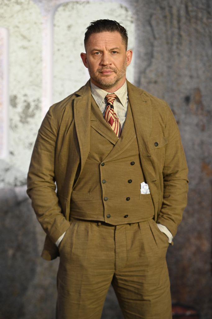 Tom Hardy in a suit at a premiere