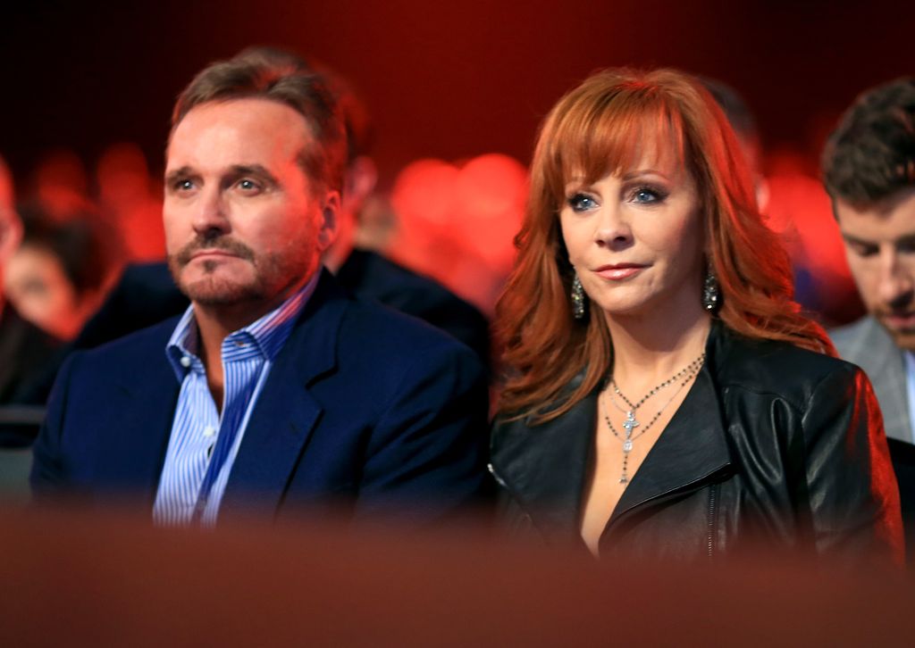 Reba McEntire, Narvel Blackstock look somber
