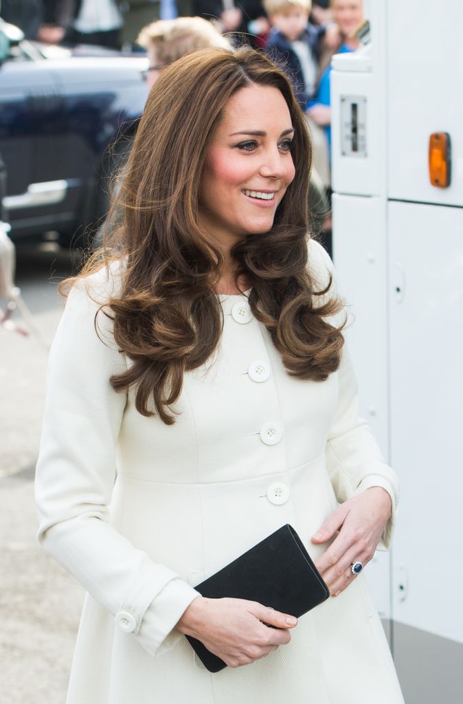 Catherine, Duchess of Cambridge in white coat dress