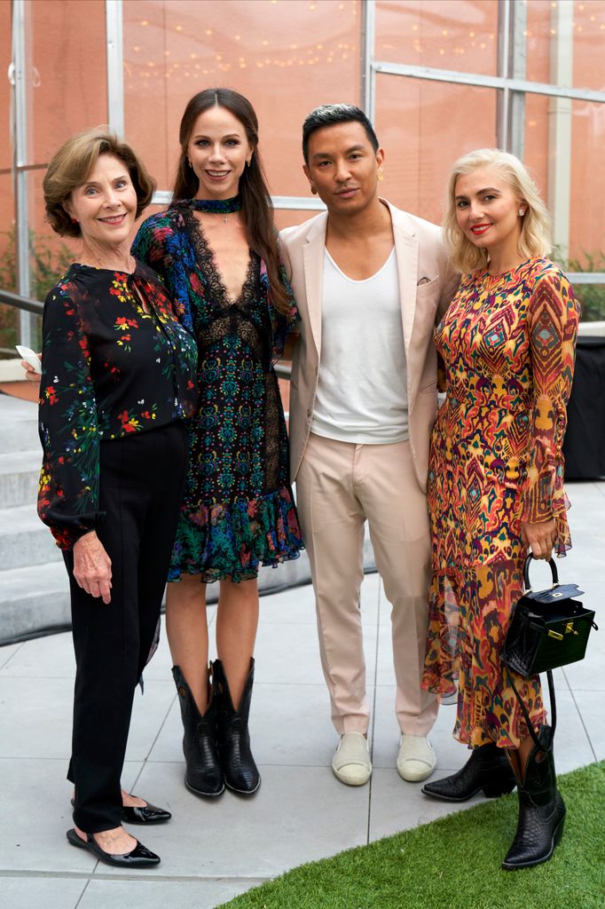 Laura Bush, Barbara Bush, Prabal Gurung and Nasiba Adilova Hartland-Mackie pose for a photo