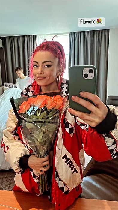 Dianne holding her roses 