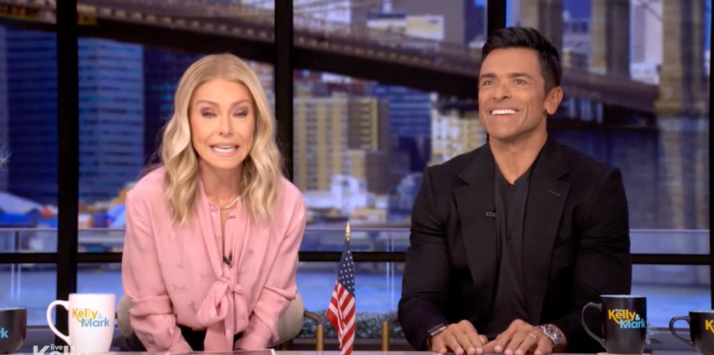 Kelly Ripa in pink shirt and Mark Consuelos in black blazer