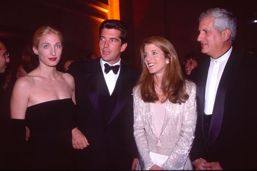 Carolyn Bessette-Kennedy (1966 - 1999) and John F Kennedy Jr (1960 - 1999) with Caroline Kennedy-Schlossberg and designer Edwin Schlossberg, attend a Municipal Art Society event (in honor of Jacqueline Kennedy Onassis) at Grand Central Station, New York, New York, October 4, 1998