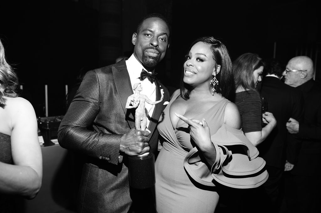 LOS ANGELES, CA - JANUARY 21:  (EDITORS NOTE: Image has been shot in black and white. Color version not available.) Actor Sterling K. Brown (L) and Niecy Nashattend People and EIF's Annual Screen Actors Guild Awards Gala sponsored by TNT and L'Oreal Paris at The Shrine Auditorium on January 21, 2018 in Los Angeles, California. 27522_008  (Photo by Charley Gallay/Getty Images for Turner)