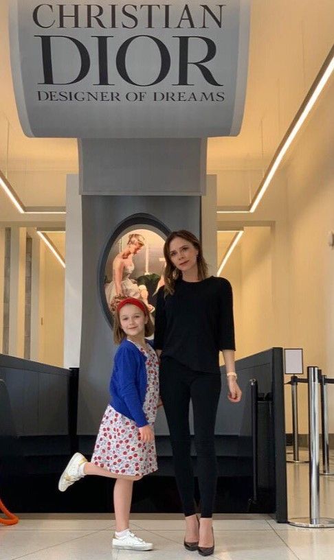Harper Beckham and Victoria Beckham at the Dior exhibit in 2019