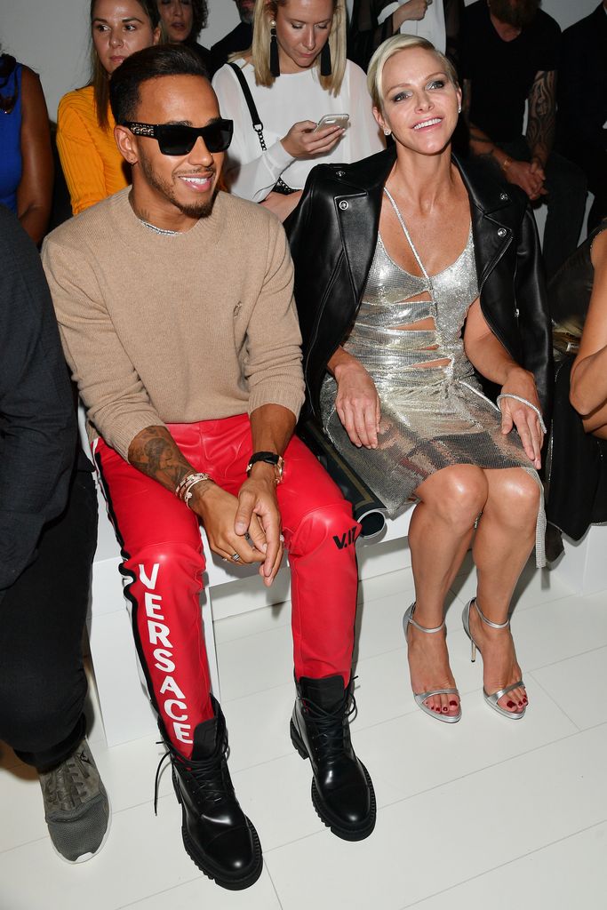 Lewis Hamilton and Charlene Wittstock attend the Versace show during Milan Fashion Week Spring/Summer 2018 on September 22, 2017 in Milan, Italy.