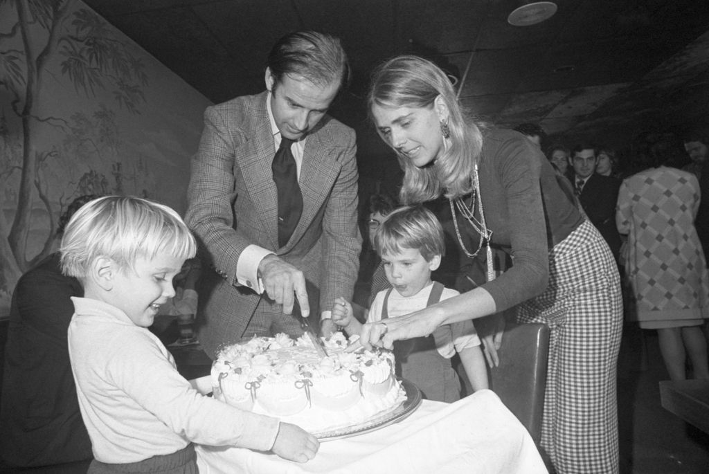 Senator-elect Joseph Biden and wife Neilia cutting his 30th birthday cake at a party in Wilmington, November 20th. His son, Hunter waits for the first piece. Biden by becoming 30 fulfilled the constitutional requirement of Senators being 30 years of age when they take office.