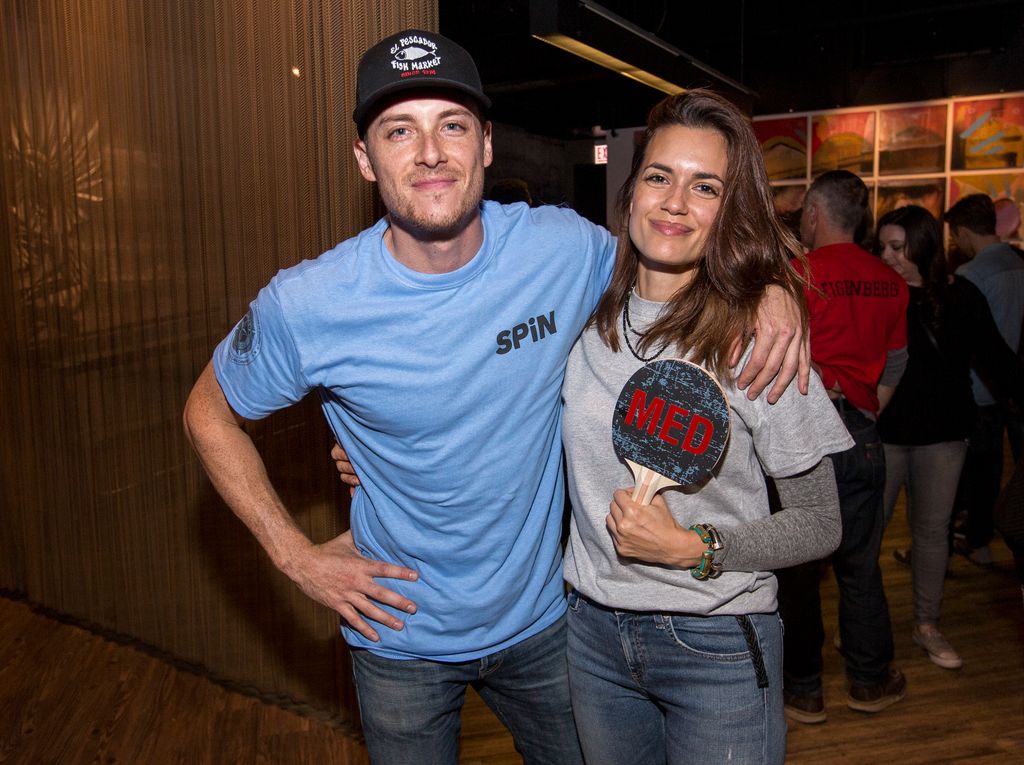 Jesse Lee Soffer and Torrey DeVitto during the 2018 Cast Paddle Battle between the Chicago Fire PD vs Chicago Fire vs Chicago Med at SPiN Chicago on September 30, 2018 in Chicago, Illinois
