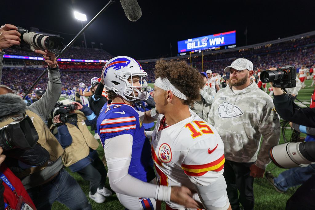 Josh Allen #17 of the Buffalo Bills and Patrick Mahomes #15 of the Kansas City Chiefs embrace after a game at Highmark Stadium on November 17, 2024 in Orchard Park, New York