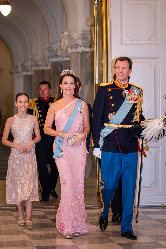Princess Athena of Denmark in pink dress, Princess Marie of Denmark in floral pink dress and Prince Joachim of Denmark attended the gala dinner