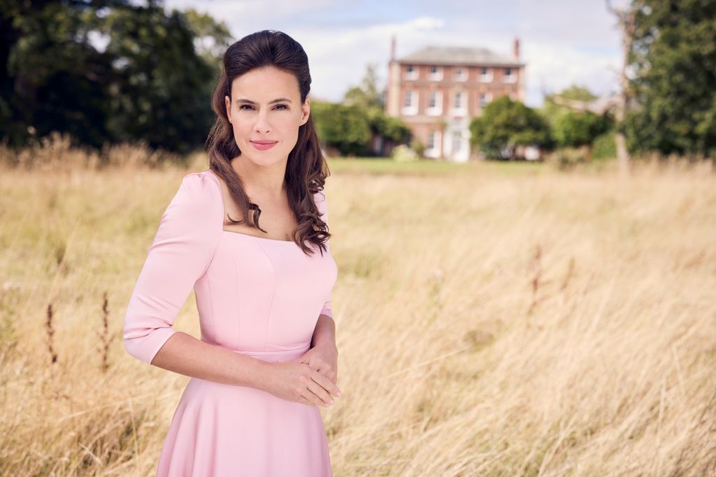 Sanditon star Sophie Winkleman poses in a pink dress