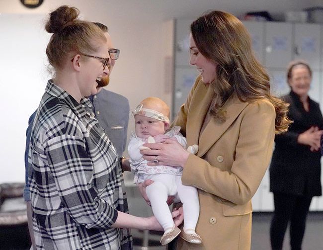 Kate Middleton holds baby in Lancashire
