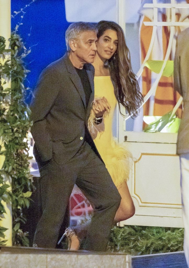 George Clooney and wife Amal arrive by boat in Tremezzo, Lake Como, joined by actress Shailene Woodley and a group of friends. The group were seen heading to a lakeside restaurant for dinner. Clooney is expected to appear at the Venice Film Festival on 28 August.